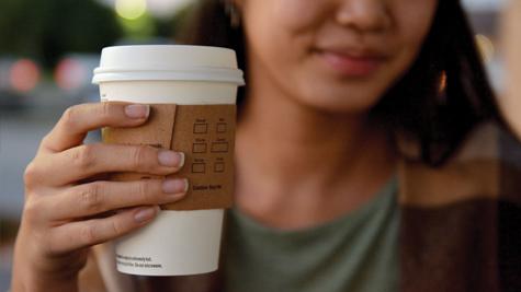 Sophomore Mandy-Uyen Dao holds a Starbuck's Pumpkin Spice Latte.