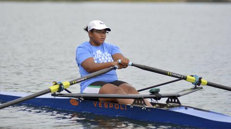 Sophmore Cateri Dixon rows practices in the Woodlands Lake three hours a day, five days a week.