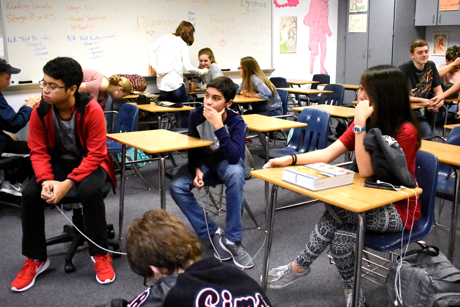 Latin students prepare for competition by using the Certamen machine before school starts. “I care about the impact of winning,” sophomore Arham Salman said. “Mr. Drugan puts in a lot of time to make the Quizlets, and it would kind of be a bummer if we didn’t win. We want to make Drugan proud.”