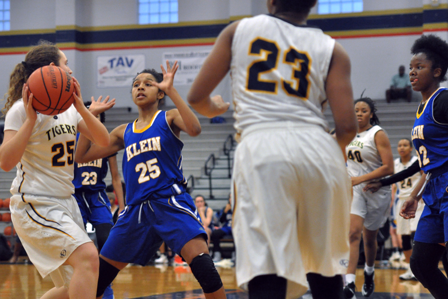 The Lady Tigers Basketball team wins in a rematch against Klein High School, becoming district champions with a district record of 13-1.