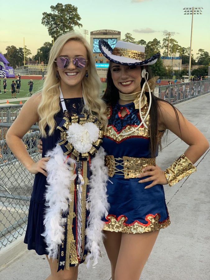 Olivia Thompson (left) celebrated the homecoming game with junior Teslyn DeLeon (right). Thompson has taught dance for eight years and has been a performer for 22 years.