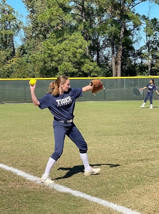 Photo of the Day (11/10/22) Softball player Olivia M. is caught in 4K preparing a pitch.