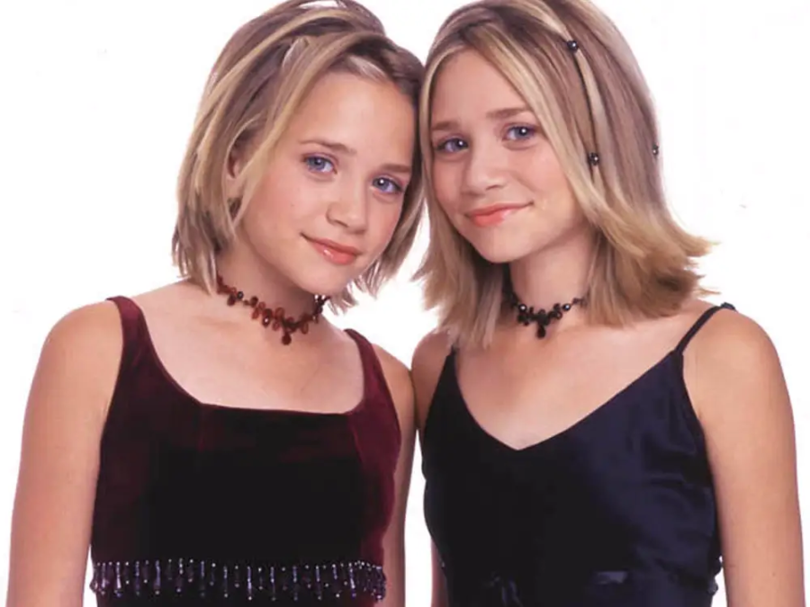 Mary-Kate and Ashley doing a photoshoot.